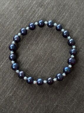 Lustrous Dark Black Pearl Stretch Bracelet with Silver Accent Beads